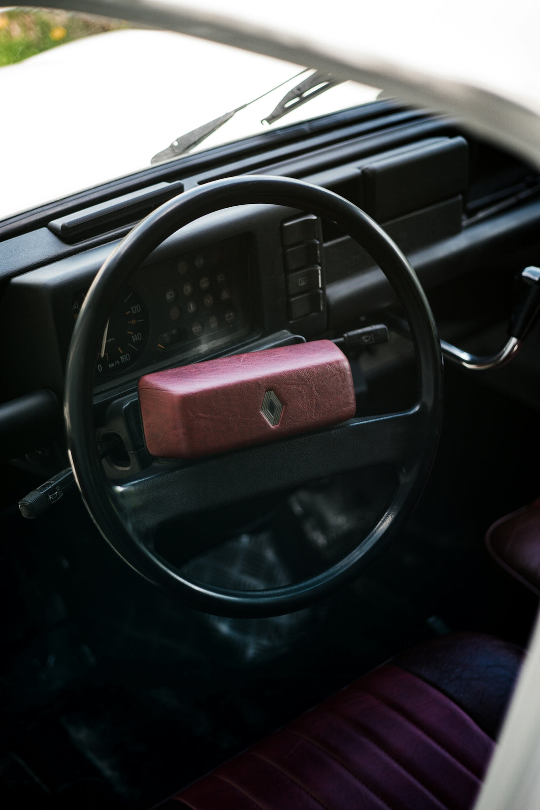 the interior of a car with a steering wheel
