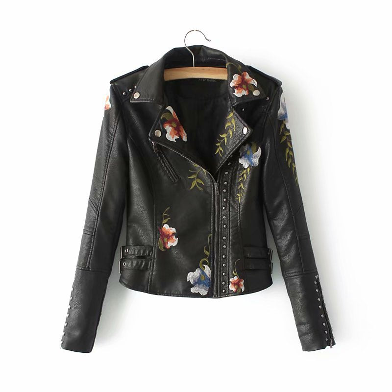 Embroidered studded leather jacket