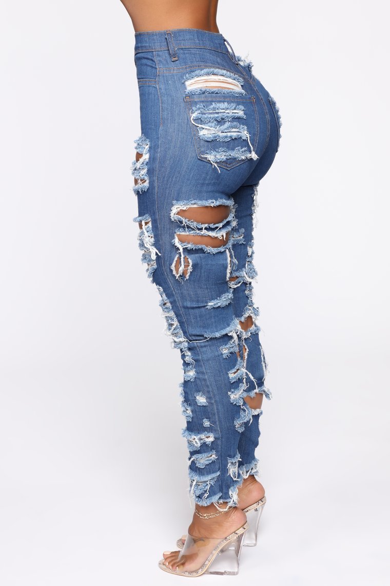 Jeans elasticizzati in vitello tagliati e strappati alla moda da donna