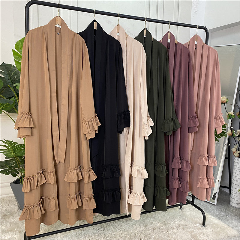 Arabisches Strickjackenkleid mit Rüschenärmeln und Schnürung aus Dubai